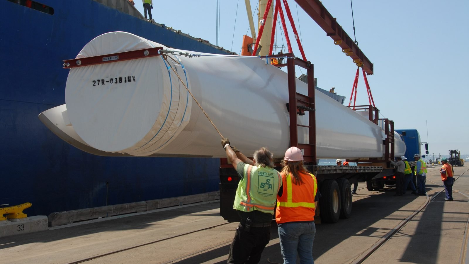 Imported wind-turbine blades being unloaded at the Port of San Diego — Photo: Dale Frost/Port of San Diego, CC BY 2.0, via Wikimedia Commons